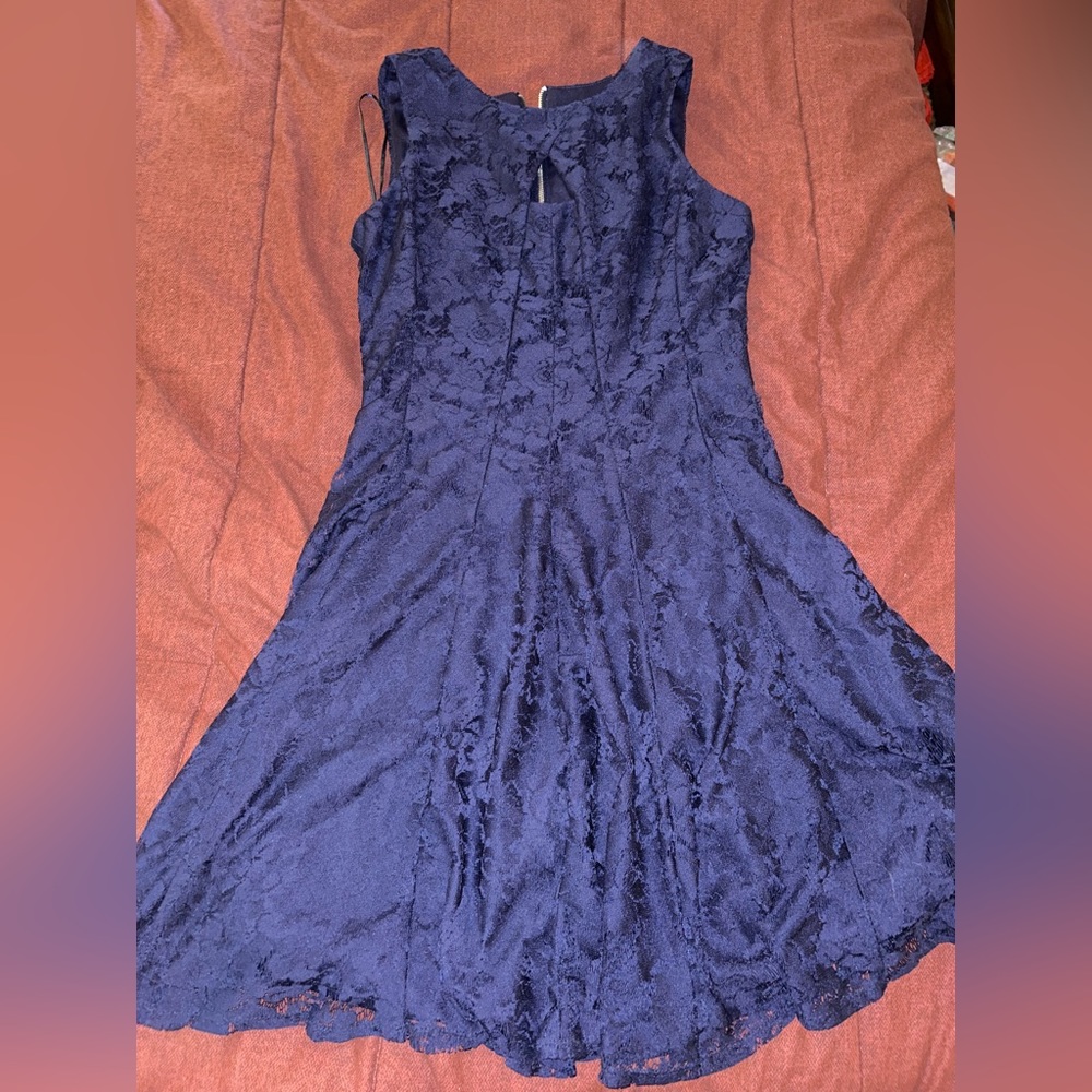 Danny and Nicole navy blue lace dress.
